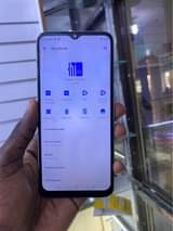 A picture of Spark 8c 64gb storage strong battery and best camera 350k
