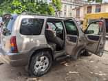 A picture of Mazda Tribute Engine gear untouched Ac not chilling 850k owner