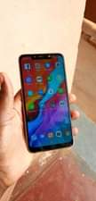A picture of Infinix hot 7 has some cracks but fully functional