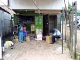 A picture of 20ft container with two stores shop spaces sold with all