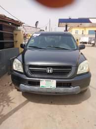 A picture of Honda pilot 2006 Baked on first body and first registration