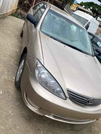 A picture of 2005 Nigeria used Toyota Camry Gold color 4Plug Buy and