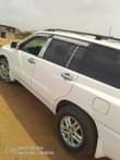 A picture of 2003 Toyota Highlander with smoking engine
