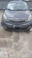 A picture of Sharp 2014 Kia Rio sound engine gear and ac partly
