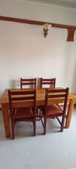 A picture of 4x6 bed plus mattress. 300k . Set of chairs at
