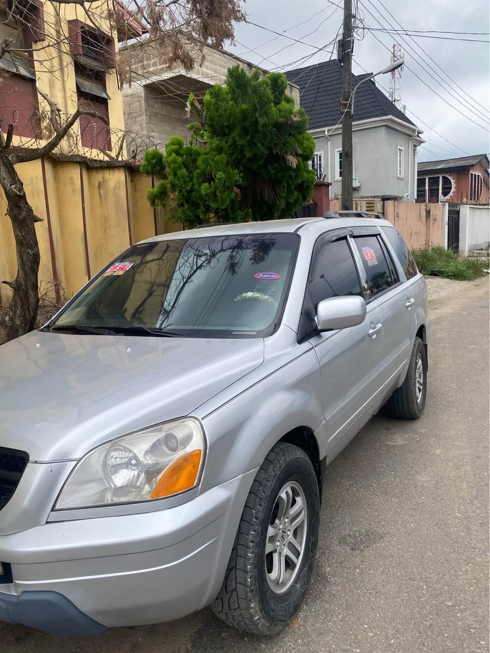 A picture of Honda Pilot tokunbo standard baked on firstbody pan location abule