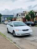 A picture of WHITE Corolla very sharp 1 3m Ogun state 07039718584