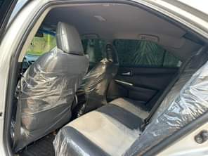 A picture of Mint 2014 Camry sport with untampered engine and follow come