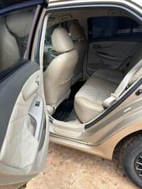 A picture of BARELY USED BUT NOT REGISTERED TOYOTA COROLLA 2010 model Bought
