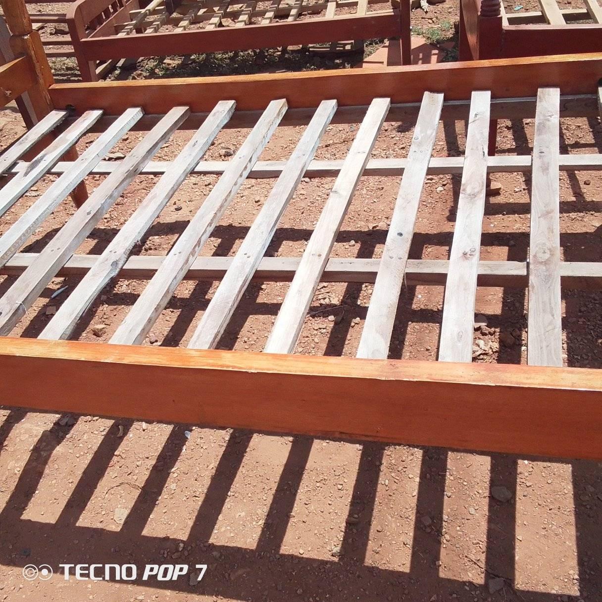 A picture of It is a Used 4by6 Wooden Bed In Good Condition