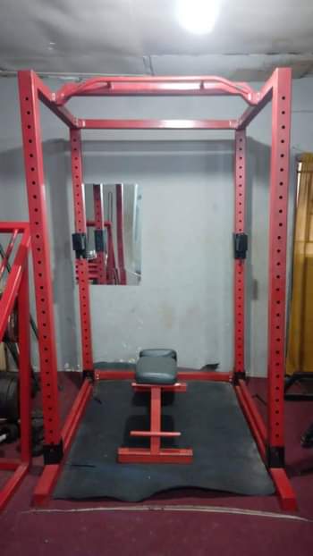 A picture of Multi functional power rack with multi functional mini beach