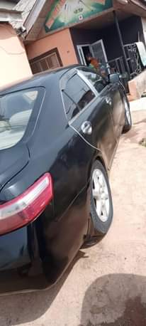 A picture of Super clean 2009 Toyota Camry Muscle neatly backed once on