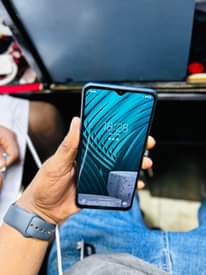 A picture of Samsung A12 128Gb 4Ram clean sana Lipia 220 000Tzs haina