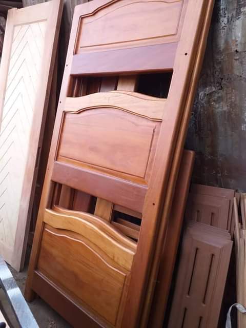 A picture of All kinds of furniture Doors poles beds stands and everything