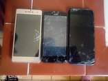 A picture of 3 smartphones