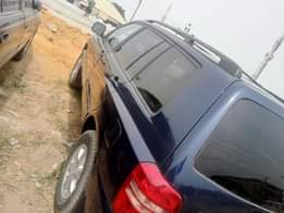A picture of Highlander 2004 buy and drive location Ona osa bus stop