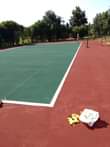 A picture of Tar surfaces and half brick paving