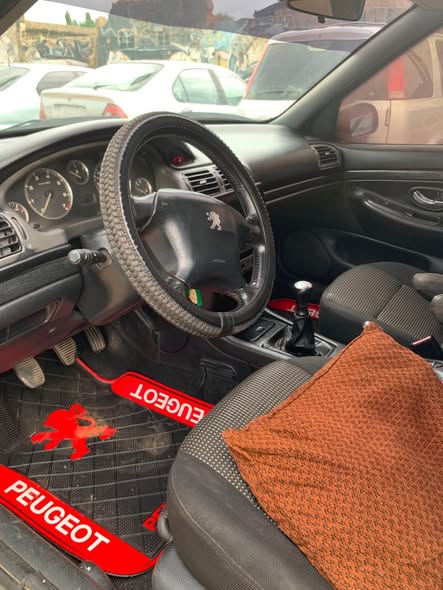 A picture of Ado motors kaduna DISTRESSSARIPEUGEOT 406 NEATLY USED 2004 MANUAL TRANSMISSION