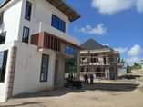 A picture of mashamba nyumba viwanja karib