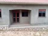 A picture of 3 houses for sale at Bombo Kalure near St Janan