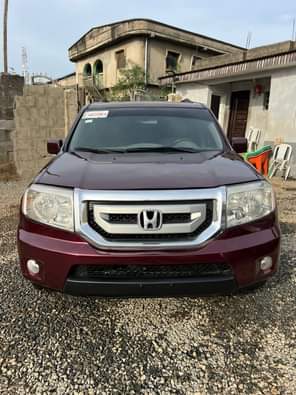 A picture of Brand Honda Model Pilot Year 2011 A C cooling Price