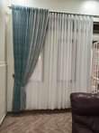 A picture of Curtains nets and curtain pipes