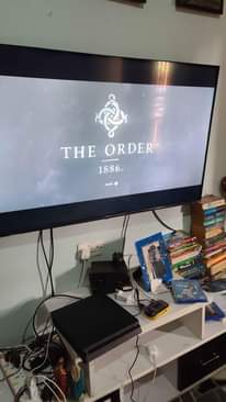 A picture of PlayStation 4 slim 1 terabyte 1 controller 0703 398500