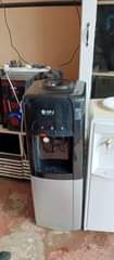A picture of SPJ water dispenser with Hot water Warm water and Cold