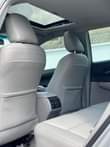 A picture of Toks XLE Toyota Camry 2014 model leather seats and Formica