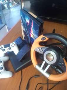 A picture of PS4 FULL SET SLIGHTLY USED BUT STILL PERFECT