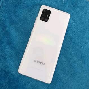 A picture of Kwa 220 tuu wai ubebe a51 ram6 gb128 ginger kwenye