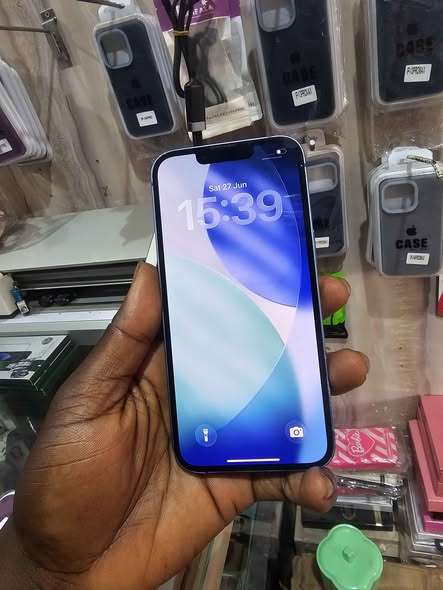 A picture of IPhone13 128gb no change part 390k Abuja deal