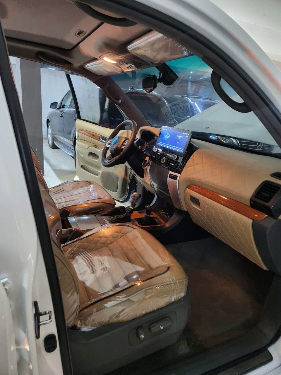A picture of 2008 gx 470 upgraded to 2024 prado with complete documents