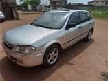 A picture of MAZDA 323F AUTOMATIC TRANSMISSION AC CHILLING BUY AND TRAVEL NOTHING
