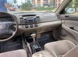 A picture of 2004 camry Ac is not good Body needs painting Engine