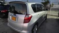 A picture of WhatsApp call 255 762 483 424 Toyota ractis Colour sliver