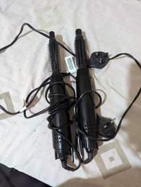 A picture of Hairdryer and hair straightener