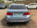 A picture of BMW 328i 2013 model Extremely clean Open sunroof Sound Engine
