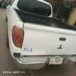 A picture of Mitsubishi pick up nd Toyota hiace bus is available on