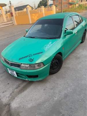 Trini-Ad C.