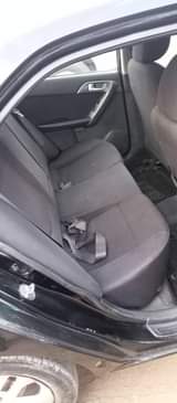 A picture of Kia Cerato 2012 with a bad gear Ac working Sound