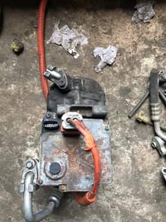 A picture of Toyota and Honda hybrid compressor available at affordable prices cheapandaffordable