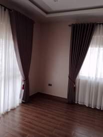 A picture of Curtains and rods
