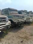 A picture of Truck and single bus