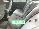 A picture of V6 Nissan altima white