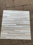 A picture of PVC Tile carpets 45k per square meter and we also