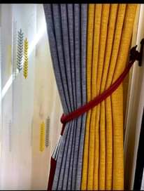 A picture of curtains and nets on affordable price