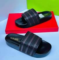 A picture of Adidas org. Tsh 24000. Size 40_45
