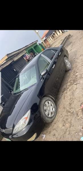 A picture of 2004 Toyota Camry Engine gear AC body painting on first