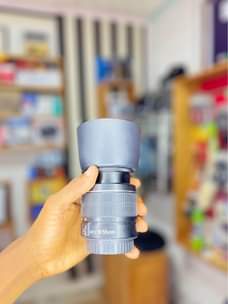 A picture of Canon 18 55mm lens with hood